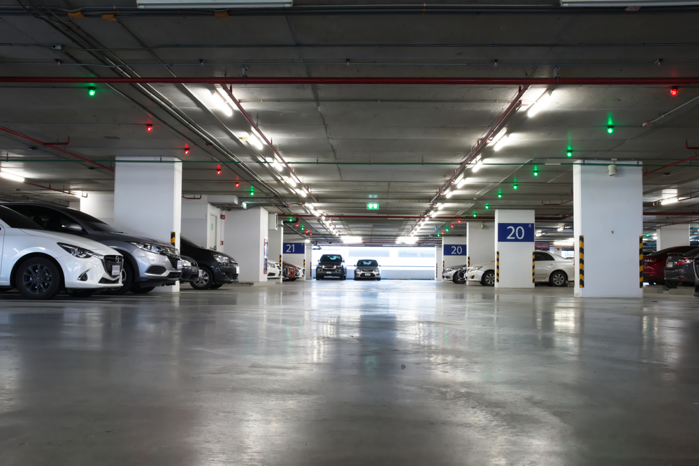 Smart,Parking,Guidance,In,Department,Store,With,Light,Overhead.,Car